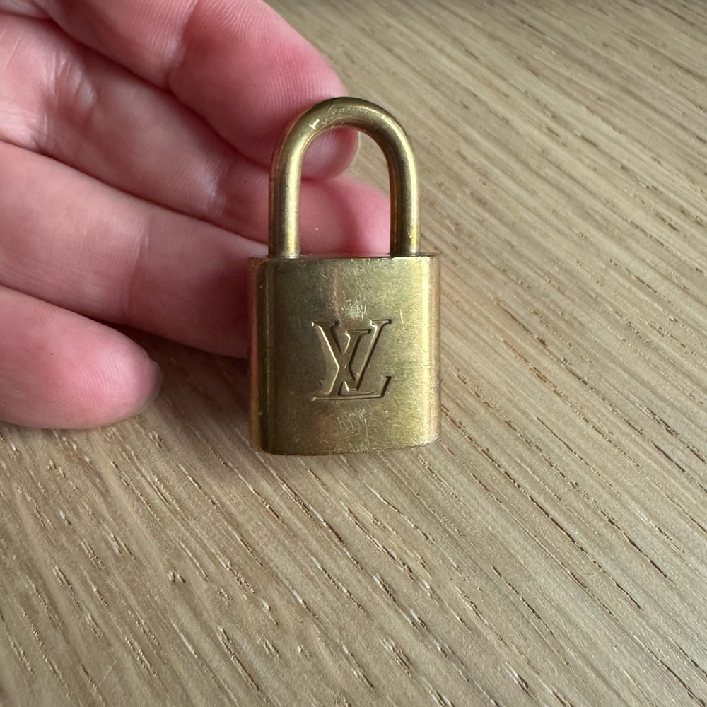 Authentic Louis Vuitton Gold Padlock